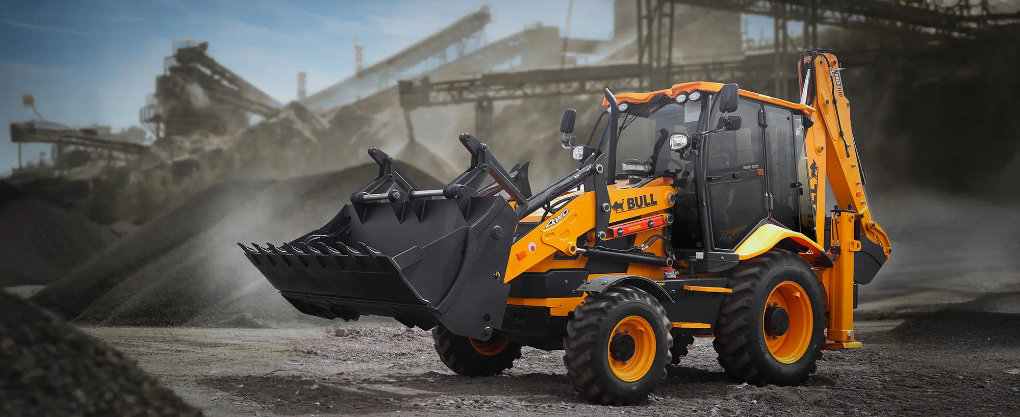Bull HD 100, rovokopač (kombinirka) na gradbišču